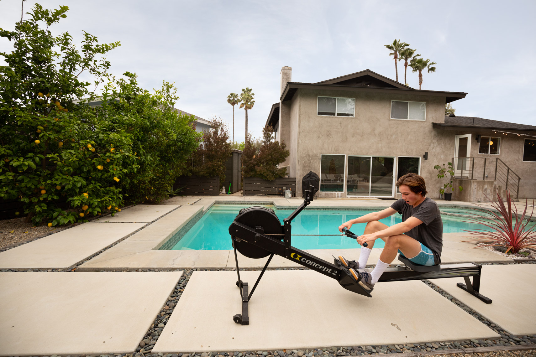 Backyard crew rowing machine
