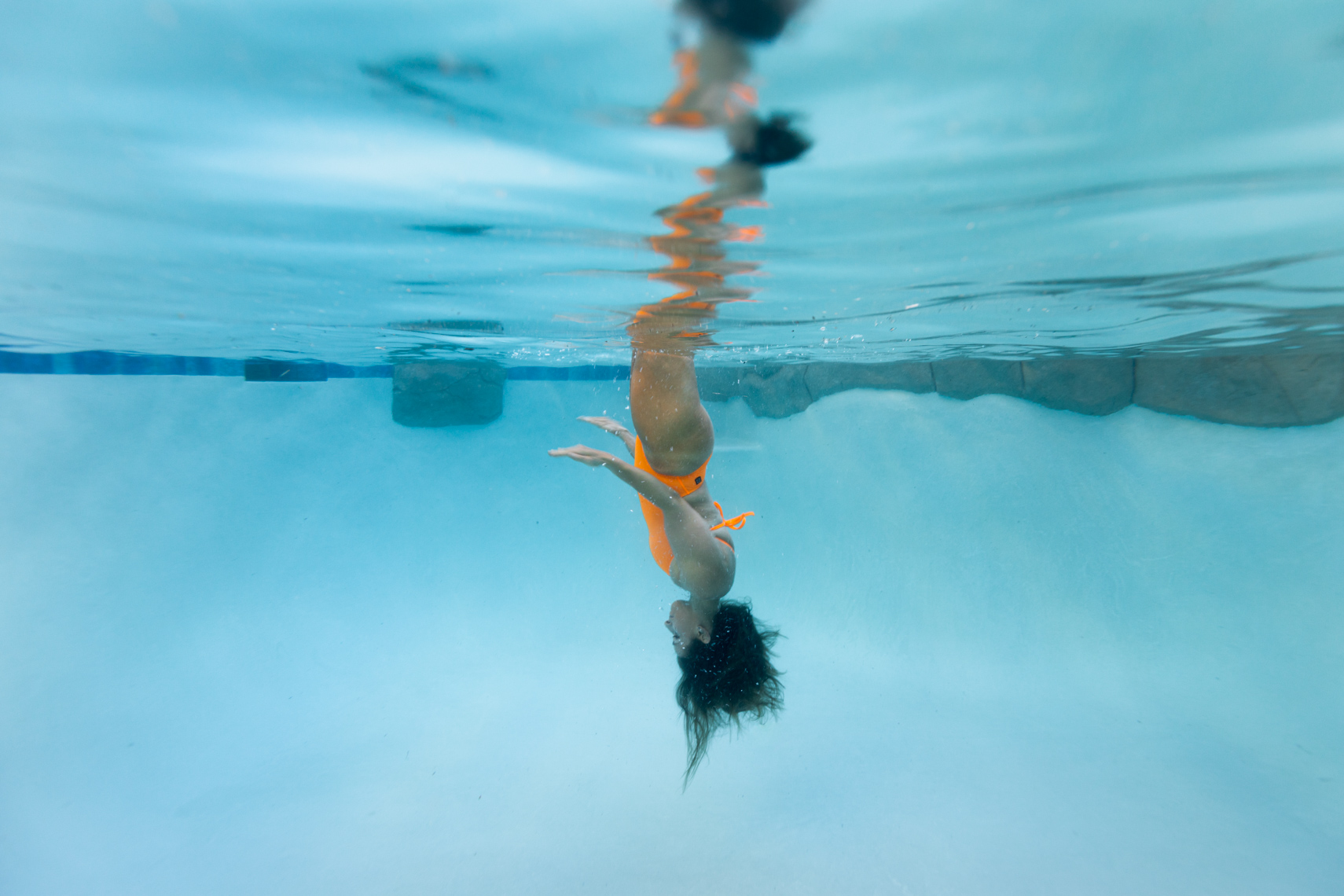 Synchro swimmer upsidedown
